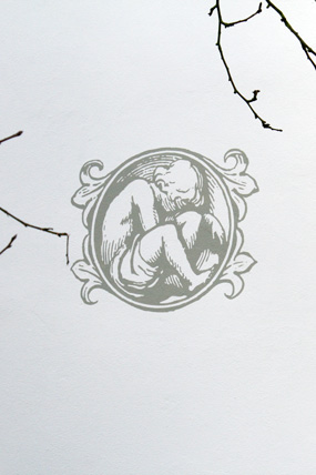 Emblem an einer Hauswand